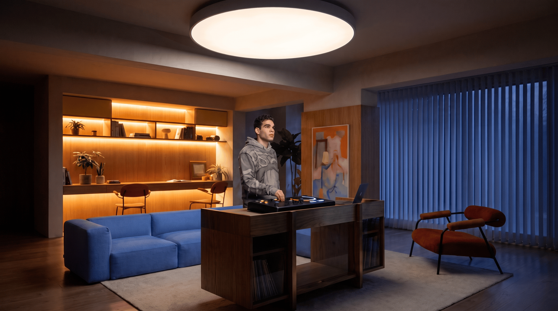 The same living room in daylight and relit to a warm evening